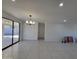 Bright dining area with tile floors and sliding glass doors leading to the patio at 1633 N 62Nd Ave, Phoenix, AZ 85035