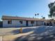 Newly renovated single story home with a modern exterior and front yard landscaping at 1633 N 62Nd Ave, Phoenix, AZ 85035