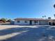 Newly renovated single story home with a modern exterior and front yard landscaping at 1633 N 62Nd Ave, Phoenix, AZ 85035