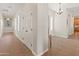 Bright hallway with tile floors and access to other rooms at 1646 W Ainsworth Dr, Anthem, AZ 85086