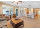 Open concept living room with views into the kitchen and dining area at 1646 W Ainsworth Dr, Anthem, AZ 85086