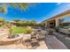 Relaxing patio area with fire pit and seating for outdoor enjoyment at 1646 W Ainsworth Dr, Anthem, AZ 85086