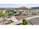 Community playground with shaded seating and play structures at 18381 W Gray Fox Trl, Wittmann, AZ 85361