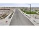 Residential street view with park in background at 18381 W Gray Fox Trl, Wittmann, AZ 85361