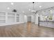 Modern dining room with hardwood floors and an open floor plan at 19724 N Jojoba Ct, Surprise, AZ 85374