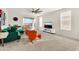 Spacious living room featuring a ceiling fan, and seamless flooring at 19724 W Palo Verde Dr, Litchfield Park, AZ 85340