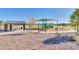 A community playground with covered seating and slides offers recreational opportunities within the neighborhood at 19724 W Palo Verde Dr, Litchfield Park, AZ 85340