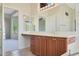 Bathroom with double sink and wood cabinets at 19939 N Golden Barrel Dr, Surprise, AZ 85374