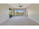 Main bedroom with golf course views and carpet flooring at 19939 N Golden Barrel Dr, Surprise, AZ 85374