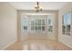 Bright dining area with a bay window and plantation shutters at 19939 N Golden Barrel Dr, Surprise, AZ 85374