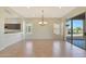 Bright dining room with tile floors and a chandelier at 19939 N Golden Barrel Dr, Surprise, AZ 85374