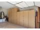 Garage with extensive built-in storage cabinets at 19939 N Golden Barrel Dr, Surprise, AZ 85374