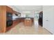 Modern kitchen features stainless steel appliances and an eat-in island at 19939 N Golden Barrel Dr, Surprise, AZ 85374