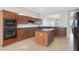 Island kitchen offers granite countertops and stainless steel appliances at 19939 N Golden Barrel Dr, Surprise, AZ 85374