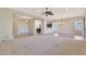 Spacious living room with carpet and views to backyard at 19939 N Golden Barrel Dr, Surprise, AZ 85374