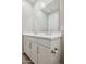 Double vanity with white cabinets and gray countertop at 21016 N 58Th Way, Phoenix, AZ 85054