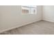 Bright bedroom with neutral walls and wood-look flooring at 21023 N 58Th Way, Phoenix, AZ 85054