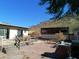 Large backyard with patio, deck, and mountain views at 211 W Kiser St, Superior, AZ 85173