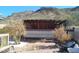 Backyard patio with covered structure and plants at 211 W Kiser St, Superior, AZ 85173