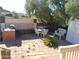 Backyard patio with brick paving, seating, and BBQ at 211 W Kiser St, Superior, AZ 85173