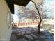 Backyard with flagstone patio and mature tree at 211 W Kiser St, Superior, AZ 85173