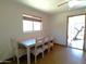 Simple dining area with a table and four chairs at 211 W Kiser St, Superior, AZ 85173