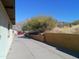 Concrete driveway leading to the house at 211 W Kiser St, Superior, AZ 85173