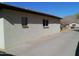 Side view of house with stucco exterior at 211 W Kiser St, Superior, AZ 85173