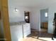 Laundry area with washer, dryer, and access to bathroom at 211 W Kiser St, Superior, AZ 85173