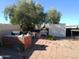 Brick patio with seating area and shed at 211 W Kiser St, Superior, AZ 85173