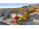 Single-story home with mountain views and landscaping at 2164 W Muirfield Dr, Anthem, AZ 85086