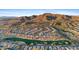 Community overview with mountain backdrop and golf course at 2164 W Muirfield Dr, Anthem, AZ 85086