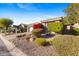 House exterior with landscaping, driveway and two car garage at 2164 W Muirfield Dr, Anthem, AZ 85086