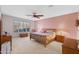 Relaxing main bedroom with soft carpeting and ample space at 2164 W Muirfield Dr, Anthem, AZ 85086