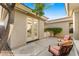 Private patio with comfortable seating and French doors at 2164 W Muirfield Dr, Anthem, AZ 85086