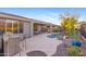 Spacious patio with pool, grill, and seating area at 2164 W Muirfield Dr, Anthem, AZ 85086