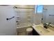 Bathroom featuring a shower-tub combination, vanity with sink, and matte black fixtures at 22311 W Monona Ln, Surprise, AZ 85387