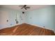 Hardwood floors and light walls in this spacious bedroom at 2232 N 13Th St, Phoenix, AZ 85006