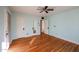 Hardwood floors and light walls in this spacious bedroom at 2232 N 13Th St, Phoenix, AZ 85006