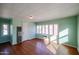 Hardwood floors and light walls in this spacious bedroom at 2232 N 13Th St, Phoenix, AZ 85006