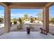 Covered patio overlooks a gravel backyard with desert landscaping at 22424 W La Pasada Blvd, Buckeye, AZ 85326