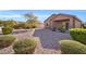 Spacious backyard with gravel and desert landscaping at 22424 W La Pasada Blvd, Buckeye, AZ 85326