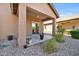 Covered patio with a view of the gravel backyard at 22424 W La Pasada Blvd, Buckeye, AZ 85326