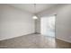 Dining area with tile floor and sliding glass door at 22424 W La Pasada Blvd, Buckeye, AZ 85326