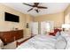 Spacious Primary bedroom with large dresser and ensuite bathroom access at 22808 N Los Gatos Dr, Sun City West, AZ 85375