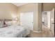 Bright bedroom with double doors and ensuite access at 22808 N Los Gatos Dr, Sun City West, AZ 85375