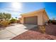 Two car garage with a long driveway at 22808 N Los Gatos Dr, Sun City West, AZ 85375