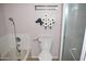 Bathroom with tub, toilet, and creative toilet paper holder at 2315 W Union Hills Dr # 112, Phoenix, AZ 85027