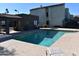 Community pool with surrounding patio and BBQ area at 2315 W Union Hills Dr # 112, Phoenix, AZ 85027