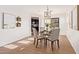 Dining area with round table and striped chairs at 2613 E Bart St, Gilbert, AZ 85295